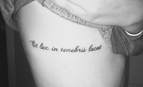 Et lux in tenebris lucet. And a light shines in the darkness. Light And Darkness Tatoos, Lux In Tenebris Tattoo, Tattoos Latin, Side Quote Tattoos, Lux In Tenebris, Rib Tattoo Quotes, Light Shines In The Darkness, Lord Of The Rings Tattoo, Latin Quotes