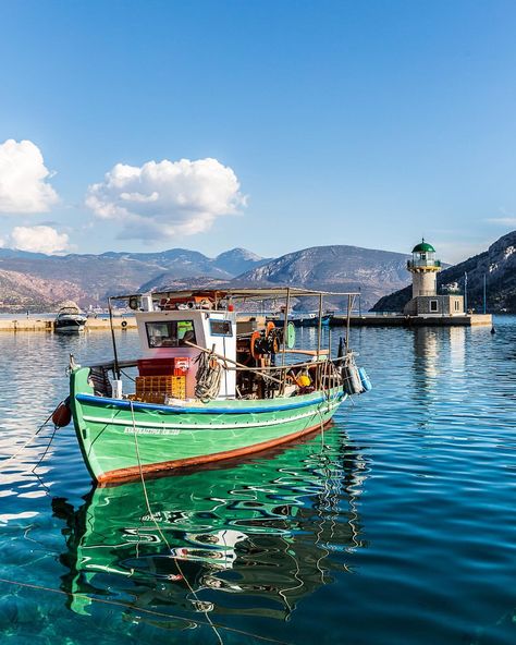 Colorful boat and a lighthouse in the seaside town of Antikyra in Greece.  #greece #antikyra #boat #lighthouse #europe #travel Boat Greece, Nature Gifs, Water Scenery, Vacation Photography, Amazing Gifs, Fine Art Landscape Photography, Old Boats, Cool Boats, Ocean Pictures