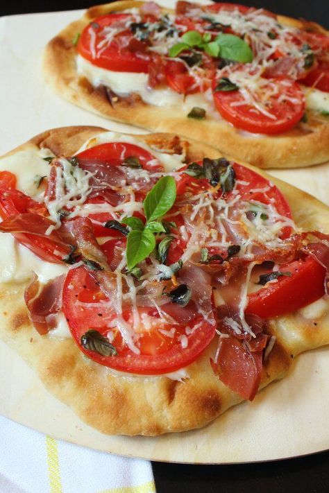 Naan Bread Margherita Pizza with Prosciutto | "I make this at least once a week! I use fresh basil and tomatoes out of my Garden. It is excellent with either fresh mozzarella, low moisture- part skim or whole milk!" #dinnerideas #dinnerrecipes #familydinnerideas #pizza #pizzarecipes #pizzaideas #homemadepizza Pizza With Prosciutto, Easy Dinners For One, Naan Bread Pizza, Grilled Romaine Salad, Prosciutto Recipes, Grilled Flatbread, Margarita Pizza, Naan Pizza, Vegan Grilling