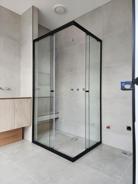 Dual frameless sliding doors enable Corner Entry options for smaller shower enclosures in confined areas, providing clear and easy access. Small Sliding Shower Door, Sliding Door Shower Enclosure, Corner Entry Shower Enclosure, Sliding Shower Screen, Shower Enclosure Ideas, Adu Bathroom, Corner Shower Door, Sliding Door Shower, Corner Shower Doors