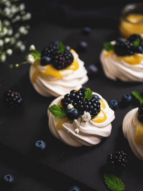 A light and glossy meringue, topped with silky smooth cream, zesty lemon dessert sauce and topped with tangy blueberries and blackberries! Individual Pavlova, Mini Pavlovas, Mini Meringues, Meringue Desserts, Dessert Sauce, Lemon Dessert, Dairy Free Cream, Hey Hey Hey, Lemon Sauce