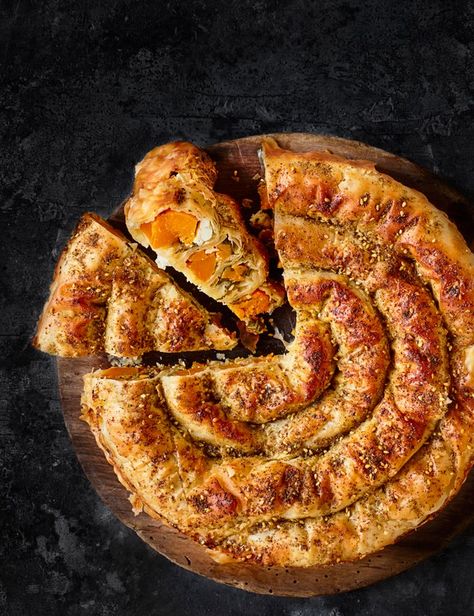 While a börek – or spiral pie – is an impressive centrepiece, it’s actually pretty easy to make. Try our simple recipe with sweet butternut squash and crumbled feta wrapped in crispy filo pastry sprinkled with za'atar Pastilla Recipe, Roast Squash, Borek Recipe, Meatless Entrees, Filo Pastry Recipes, Veggie Dinners, Work Lunches, Filo Pastry, Easy Pie Recipes