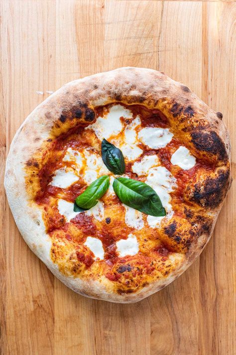 I've been painstakingly trying to perfect Neapolitan-style pizza using a conventional kitchen oven. It's incredibly hard to match the qualities of brick oven pizza using a regular oven, however, I've gotten really close with the right tools and techniques. After much trial and error, I've finally cracked the code for making really good pizza without expensive equipment. #homemadepizza #pizza #margheritapizza Margherita Pizza Recipe, Plant Based Pizza, Pizza Appetizers, Brick Oven Pizza, Pizza At Home, Oven Pizza, Pizza Kitchen, Pizza Crust Recipe, Brick Oven