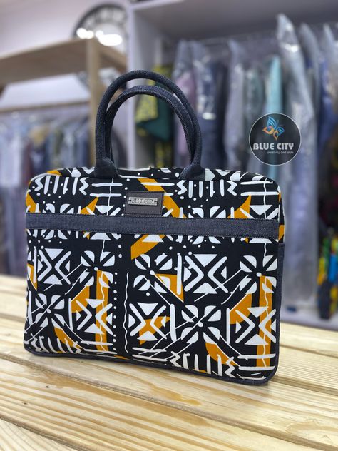 These collection of laptop/handbags are made with quality ankara/African print fabrics and a touch of jeans/leather. Carefully crafted to suit all your clothing and gadgets. Comes in a size of 16 inches by 13 inches. We do wholesale and retail. Send us a WhatsApp message +233240926564 Worldwide shipping assured Laptop Handbags, Ankara Accessories, Traveling Bag, Laptop Handbag, African Accessories, Bag Designs, Blue City, Printed Handbags, Whatsapp Message