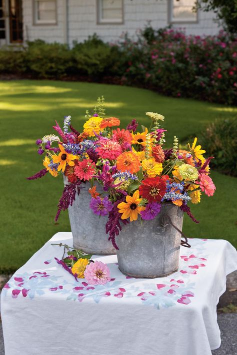 Backyard Blooms | Add a touch of Southern elegance to your home with these colorful flower arrangements. Colorful Flowers Arrangements, Bouquet Champetre, Southern Elegance, Spring Flower Arrangements, Flower Bucket, Garden Area, Living Coral, Cut Flower Garden, Have Inspiration