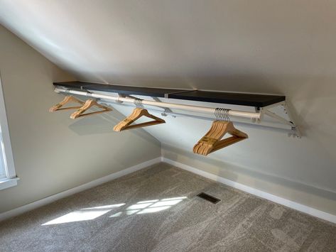 Angled Closet Ideas Sloped Ceiling, Angled Ceiling Closet, Slanted Ceiling Closet, Sloped Wall, Slanted Ceiling Bedroom, Attic Bedroom Storage, Slanted Walls, Ceiling Shelves, Attic Bedroom Designs