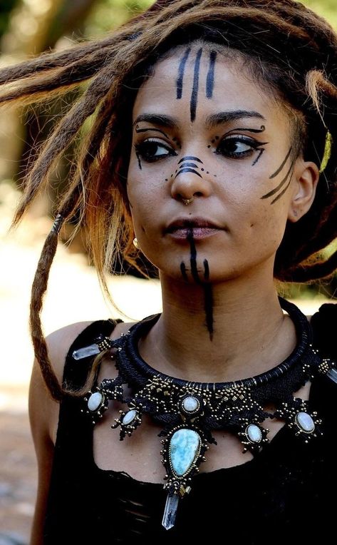 Halloween Costumes Dreadlocks, Cultural Face Paint, Shaman Face Paint, Aztec Makeup Ideas, Magical Face Paint, Nordic Face Paint, Caveman Makeup, Female Viking Makeup, Romani Makeup