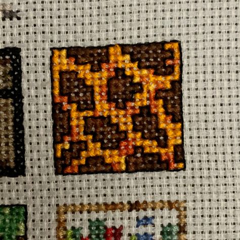 Cross stitch Minecraft magma block pattern Minecraft Cross Stitch Pattern, Cross Stitch Minecraft, Minecraft Embroidery, Minecraft Cross Stitch, Minecraft Tnt Block, Minecraft Pumpkin, Minecraft Earth, Minecraft Blocks, Corner To Corner Crochet