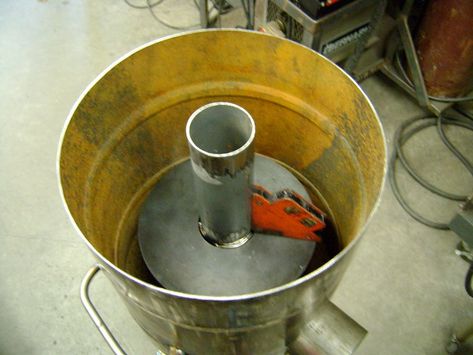 Fabricating a Heavy-Duty Rocket Stove : 11 Steps (with Pictures) - Instructables Rocket Stove Water Heater, Frontier Stove, Rocket Heater, Air Compressor Tank, Compressor Tank, Rocket Mass Heater, Rocket Stove, Solar Hot Water, Chuck Wagon