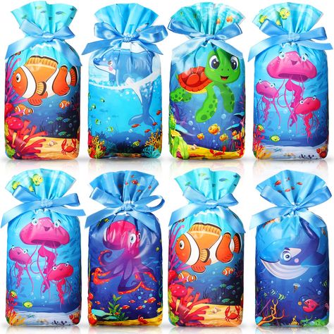 PRICES MAY VARY. Valuable and Adorable Set: there are 60 pieces of under the sea gift bags, with 6 adorable cartoon sea animal styles, like jellyfish, turtles, clownfish, octopus, 10 pcs for each style, all looking creative and colorful, ideal for serving as party favors for kids' birthday party, under the sea theme parties, and ocean themed parties Reliable and Portable: these under the sea party favor bags are made of quality plastic, lightweight and reusable; These sea themed goodie bags have Gift Bags Birthday, Scuba Vbs, Nemo Birthday Party, Animal Party Favors, Nemo Birthday, Sea Life Decor, Mermaid Party Supplies, Cartoon Sea Animals, Bulk Party Favors