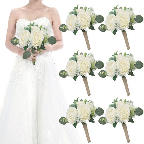 PRICES MAY VARY. Set of 6 artificial bridesmaid bouquets for wedding. Made of a mix of high quality silk and plastic type material. Natural twine around the base of the rose bouquets. 7 Inch wedding fake bridesmaid bouquets consists of white roses and green eucalyptus branches. Simple but romantic. Pre-made bridesmaid bouquet will be perfect for your vintage, rustic or boho wedding ceremony party. You can use them for wedding decor, then home decor afterward. These artificial flower bouquets are Bridemaid Bouquet, Bouquets For Wedding, Anniversary Centerpieces, Wedding Bridesmaid Bouquets, Boho Wedding Ceremony, Eucalyptus Branches, Green Eucalyptus, Bridesmaid Bouquets, Artificial Flowers Wedding