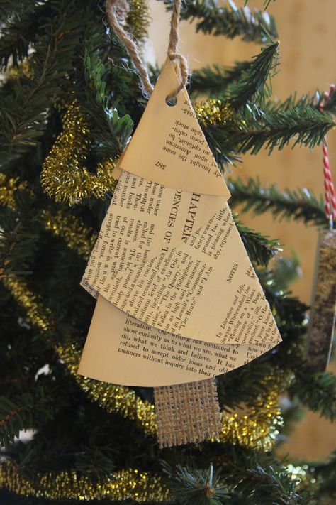 Christmas tree ornaments made from antique book pages. $5 Literary Christmas Tree, Music Christmas Ornaments, Diy Natal, Book Christmas Tree, Christmas Crafty, Book Tree, Book Page Crafts, Cool Christmas Trees, Christmas Ornaments Homemade