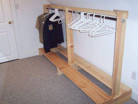 nice and simple--put shelf on top maybe wider end boards too? Wood Clothing Rack, Wooden Clothes Rack, Wood Clothing, Diy Clothes Rack, Side Doors, Wood Clothes, Market Ideas, Shirt Diy, Clothes Pin Crafts