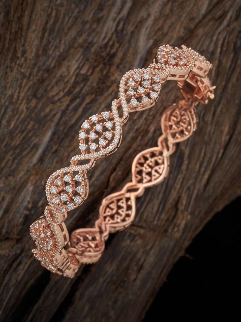 Rock the next party with flamboyant rose gold bangles. Invest in both everyday and party collections to complete the look. Bangle Designs Latest, Gold Bangle Designs, Rose Gold Bangles, Rose Gold Jewellery, Kalyan Jewellers, Rose Gold Bangle, Gold Bangles Design, Gold Diamond Jewelry, Bangle Designs