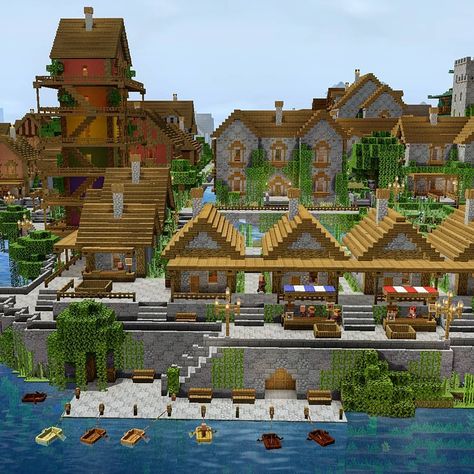 MinecraftGranny on Instagram: “Today I have finished the western part of Brexitville with a fishmarket and can begin to build on the empty surfaces of the southern part.…” Minecraft Farm Village Ideas, River Town Minecraft, Minecraft Harbor Town, Fishing Town Minecraft, Town Center Minecraft Ideas, Minecraft Sea Village, Minecraft Merchant Stall, Fishing Village Minecraft, Minecraft Seaside Town