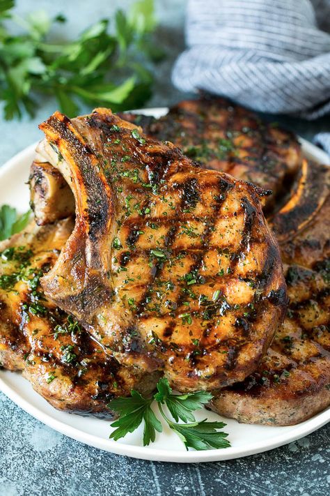 Grilled Pork Chops | Pork Chop Marinade #porkchops #grilling #pork #marinade #dinner #dinneratthezoo Pork Chops Grilled, Best Pork Chop Marinade, Marinated Pork Chops Grilled, Pork Chop Marinade Recipes, Best Grilled Pork Chops, Grilled Pork Chops Marinade, Pork Chop Brine, Pork Chop Marinade, Pork Chop Recipes Grilled