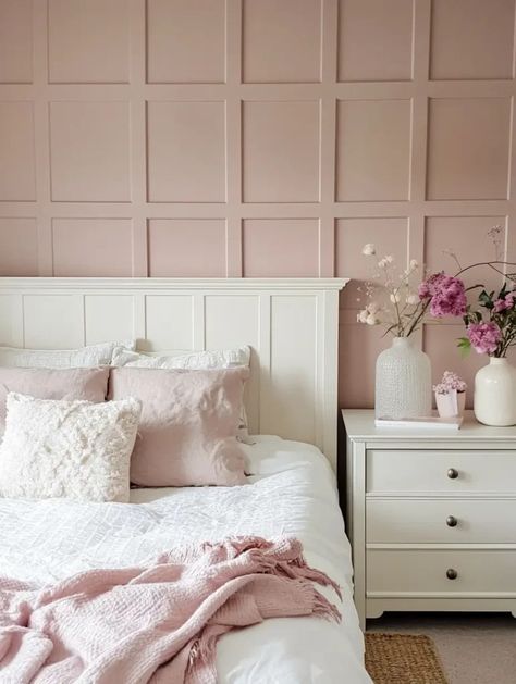 A bedroom painted in  SULKING PINK ROOM by Farrow & Balls. White wooden bed with lace pillows and a white wooden night stand with ceramic flower vase. A truly feminine bedroom! Behr Rosewater Paint, Sherwin Williams Neutral Pink, Light Dusty Rose Paint Color, Blush And Taupe Bedroom, Vintage Tea Rose Paint Behr Nursery, Dusty Rose Wall Color, Dusty Rose Paint Color Sherwin Williams, Vintage Tea Rose Paint Behr, Dusty Rose Paint Color