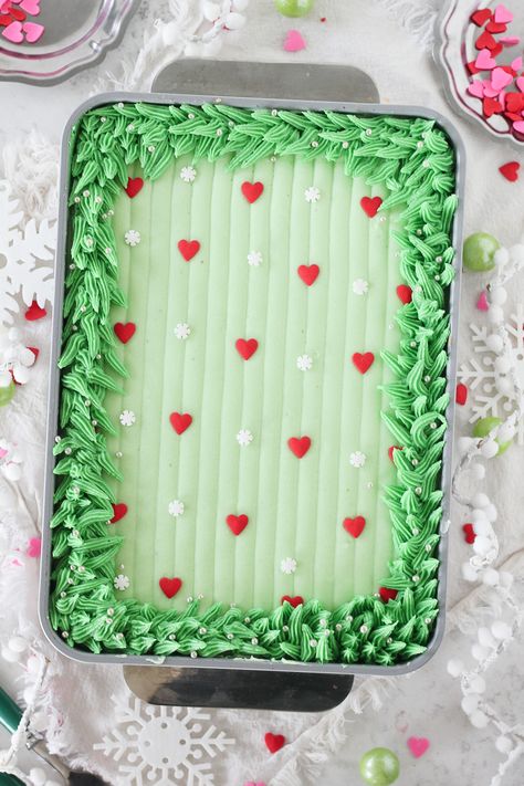 Christmas Grinch Pistachio Sheet Cake Holiday Sheet Cakes, Holiday Cakes Winter, Christmas Cake Rectangle, Grinch Baby Shower Cake, Grinch Cookie Cake, Christmas Buttercream Board, Winter Cake Decorating Ideas, Woodland Sheet Cake, Christmas Loaf Cakes