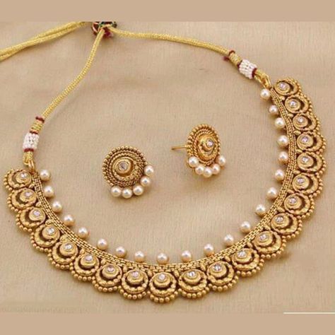 Beautiful Bollywood set ideal for weddings and special occasions. #bollywood #indian #jewellery #fancy #gift #style Gold Necklace Set For Bride, Diamond And Gold Necklace, Gold Pearl Jewelry Set, Diamond Pearl Necklace Set, Contemporary Gold Jewellery, Indian Choker Necklace Set, Traditional Choker Necklace, Gold Set Design, Indian Gold Necklace Designs