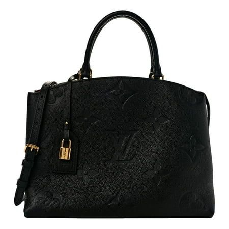 This Louis Vuitton Monogram Giant Empreinte Grand Palais Satchel is crafted from the signature monogram coated canvas with black embossed logo. With ample interior space and a zipper pocket, this handbag is perfect for women on the go. Elevate your everyday look with this sophisticated fashion classic. Pre-owned Condition: Excellent, little to no signs of wear Two Leather Shoulder Straps Zip Closure Two external pockets Black Leather Red suede Lining Gold Hardware Length: 16" Height: 8.5" Depth: Sophisticated Fashion, Buy Louis Vuitton, Large Purse, Grand Palais, Red Suede, Embossed Logo, Sophisticated Style, Louis Vuitton Handbags, Everyday Look