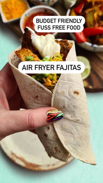 Becky Excell on Instagram: "AIR FRYER FAJITAS 😍 I don’t know about you, but one of my favourite meals that we have basically every single week is fajitas and since we started making the filling in the air fryer everything has just gone up a notch. QUESTION: If you have an air fryer, what is your favourite thing to cook in it? Let me know 😇 Ingredients: 500g chicken breast, chopped 3 peppers, sliced chunkily 1 tbsp garlic oil 1 tsp cayenne pepper (reduce if you prefer less spicy) 2 tsp ground Air Fryer Fajitas, Becky Excell, Chicken And Peppers, Gluten Free Wraps, Guacamole Salsa, Garlic Oil, Cayenne Pepper, Grated Cheese, Fryer Recipes