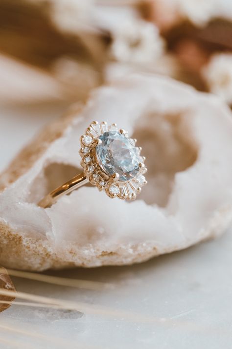 Pale Blue Diamond Engagement Ring, Light Blue Sapphire Engagement Ring Oval, Sky Blue Sapphire Engagement Ring, Ice Blue Diamond Ring, Engagement Rings With Blue Accents, Light Blue Topaz Engagement Ring, Light Blue Rings Engagement, Blue Vintage Engagement Ring, Beach Inspired Engagement Rings