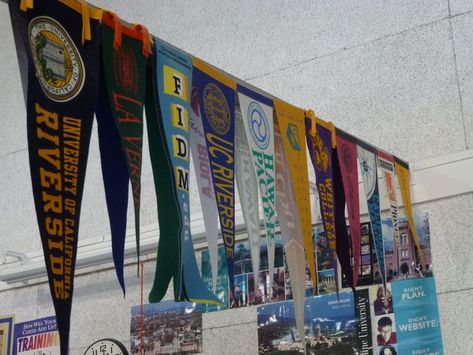 hanging college pennants College Pennant Display, Industrial Boys Bedroom, Pennant Display, Boys Bedroom Paint Color, Vintage Boys Bedrooms, College Banner, College Pennants, College Counselor, School Counseling Office