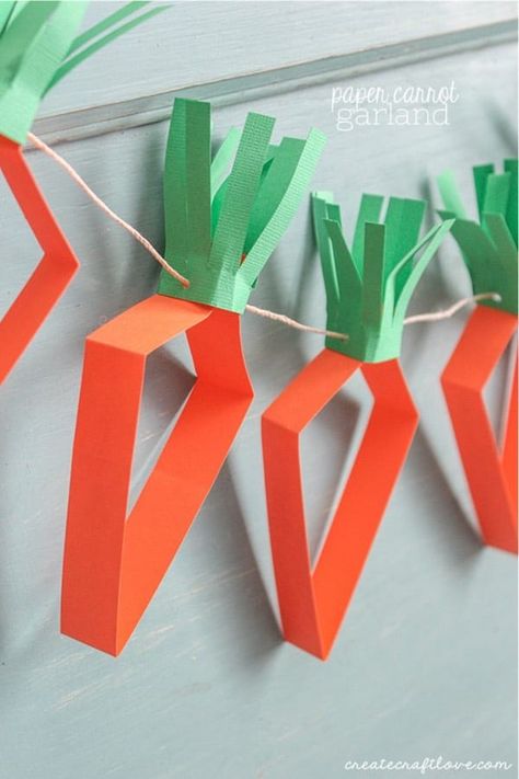 If you have a stack of construction paper just waiting to be turned into a fun craft for the kids, check out these awesome construction paper craft ideas and tutorials for inspiration! Carrot Crafts, Cafeteria Decor, Easter Diy Kids, Carrot Garland, Paper Carrots, Easter Paper Crafts, Paper Flower Wreaths, Construction Paper Crafts, Paper Flower Crafts