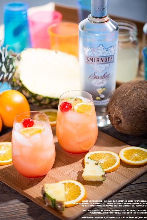 Sorbet Sunshine with 4 oz orange juice, 1 oz SMIRNOFF® Sorbet Light Pineapple Coconu and grenadine (drizzled). Garnish: cherries, orange, pineapple. Add ice to glass. Add juice, vodka, and stir. Drizzle in grenadine. Garnish with cherries, pineapple, & orange slices. #Smirnoff #SorbetLight #Drink #Recipe#SmirnoffContestEntry Smirnoff Drinks, Beach Dinners, Drinking Gifts, Cherry Drink, Beach Dinner, Drinking Gift, Spring Refresh, Vodka Drinks, Pineapple Coconut