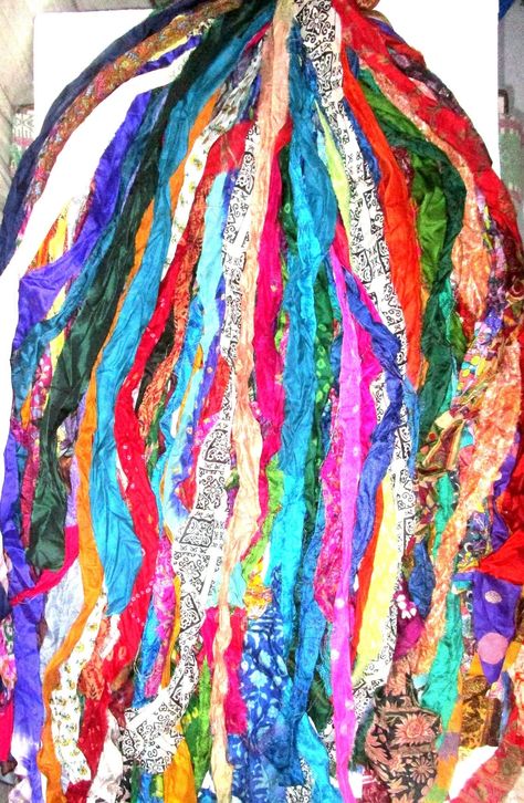 PRICES MAY VARY. Pure Silk Sari Fabric Skeins / Yarn / Ribbons / Handmade Total 42 Strips, each strip 1 yard (36 inches) long, and around 1 to 2 inches wide, tied at the top. Pull out the ones you want to use and retie! Made from Pure Silk Sarees! Made from Vintage/ Recycled silk, so they can have irregular weaves. Edges are frayed which adds to the beauty! Can be use for small projects, decorating, gift wrapping, scrapbooks, journals, jewelry etc Each bundle is completely unique. If you want ex Sari Ribbon, Recycled Sari Silk, Ribbon Yarn, Silk Fabrics, Vintage Sari, Journal Scrapbook, Sewing Ribbon, Sari Fabric, Pretty Fabric