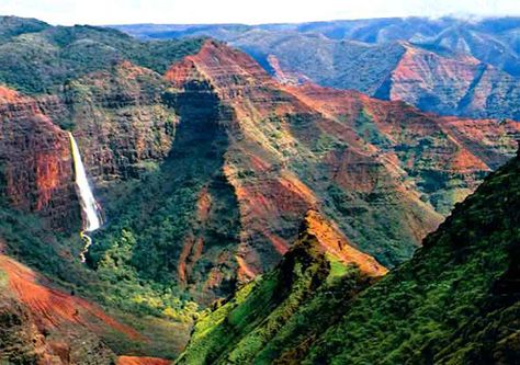 Most people don't know that the island of Kauai is the home to Waimea Canyon.  Many people think it's actually more majestic than the Grand Canyon because it's covered with lush growth.  It's astonishing and this alone is worth the trip to Hawaii.  (Although there are LOTS of great reasons to head to Hawaii.) Waimea Kauai, Kauai Vacation, Waimea Canyon, Kauai Hawaii, The Grand Canyon, Hawaii Vacation, Hawaiian Islands, Hawaii Travel, Amazing Places