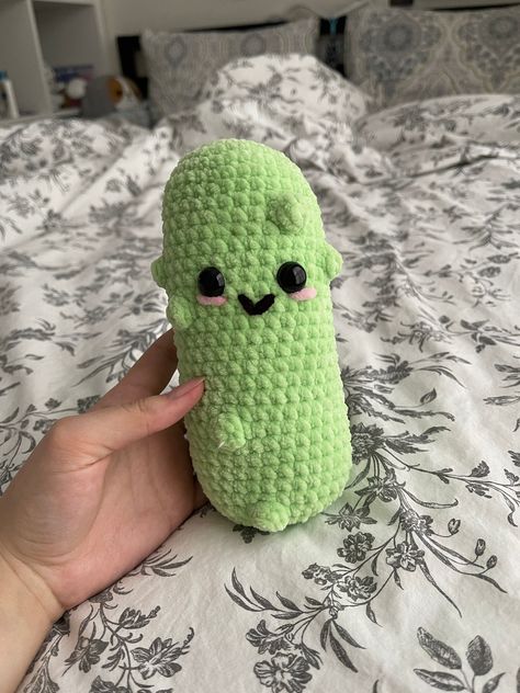 🥒🌟 Handmade Crocheted Jumbo Pickle Plushie 🌟🥒 Get ready for a big dill with our Handmade Crocheted Jumbo Pickle Plushie! Handcrafted with love and care, this oversized pickle is sure to add a splash of whimsy to your life. 🎁 Perfect Gift for Every Occasion: Whether it's Valentine's Day, an anniversary, a birthday bash, or any special occasion, our Jumbo Pickle Plushie makes a unique and hilarious gift. Its larger-than-life size and quirky charm are sure to bring laughter to your loved one's Green Crochet Patterns, Crochet Big Plushies, Pickle The Dinosaur, Pickle Plushie, Oversized Stuffed Animals, Crochet Pickle, Pickle Gifts, Big Dill, Funky Gifts