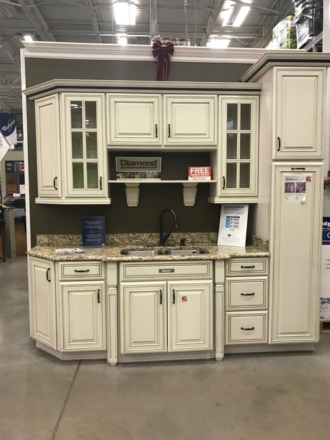 Cream cabinets Diamond Now Caspian Cream Colored Kitchen Cabinets Farmhouse, Rustic Kitchen Cream Cabinets, Cream Antiqued Cabinets, Diamond Now Cabinets, Diamond Cabinets Kitchens, Cream Cabinets Kitchen, Cream Country Kitchen, Provincal Stain Cabinets, Cream Colored Kitchen Cabinets