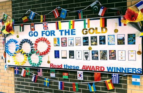 Olympic Bulletin Board, Ela Bulletin Boards, Ar Goals, School Library Bulletin Boards, Book Fairs, Team Theme, Olympic Theme, Elementary School Library, High School Library