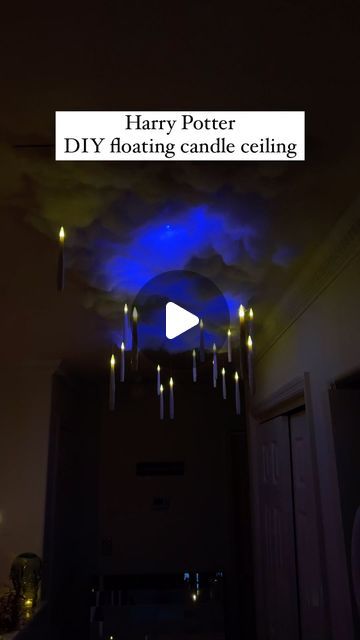 lexi yurgin on Instagram: "Harry Potter DIY floating candle ceiling!!!

I was so excited to make this for my Halloween party this year. Thank u Ryan and friends for helping my HP dreams come true. 

WHAT YOU’LL NEED:
-poster board (I used 2 thicker pieces of poster board that were 2x3 ft)
-spray adhesive (we used exactly 1 can)
-poly fill (we used exactly 1 bag)
-blue LED light strips (I got 1 strip on Amazon, but make sure they have a lightning effect)
-floating candles with fishing wire attached (also found on Amazon and they turn on with a wand which I also used for my Bellatrix costume lol)
-heavy duty command strips (we used about 20)

STEPS:
1. Tape the poster boards together with packing tape 
2. Tape the blue LED lights to the poster board in a random loopy design to mimic a lightn Floating Candles Harry Potter Ceilings, Harry Potter Night Sky Ceiling, Diy Harry Potter Lamp, Diy Harry Potter Ceiling, Harry Potter Ceiling Clouds, Harry Potter Cloud Ceiling, Harry Potter Candles Floating, Floating Candles Ceiling, Floating Candles Harry Potter