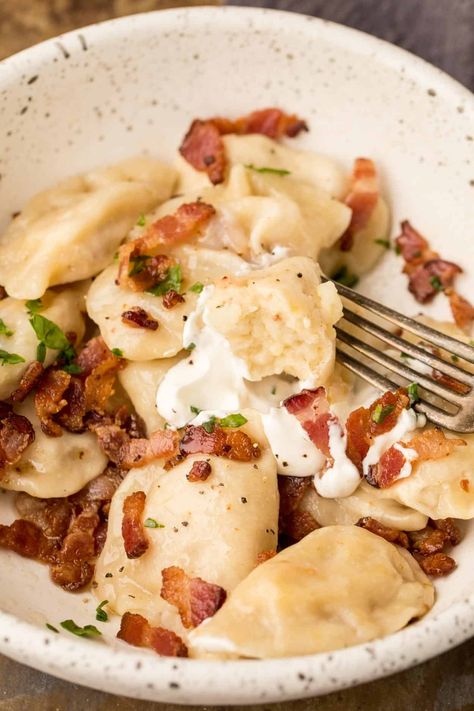 A classic Russian pierogi recipe made with homemade dough and a cheesy potato filling with bacon. Cheese Perogies Recipe, Potato Pierogi Recipe, Perogie Dough Recipe, Potato Perogies, Pierogies Homemade, Cheese Pierogi Recipe, Potato Pierogi, Cheesy Bacon Potatoes, Perogies Recipe