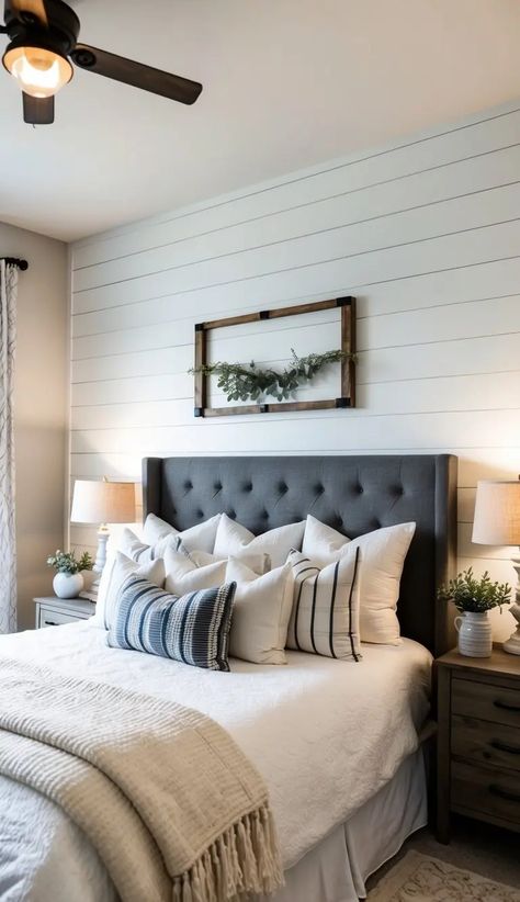 Sophisticated farmhouse-inspired master bedroom with a tufted grey headboard, chunky knit blanket, and wooden beams. Master Bedrooms Farmhouse, Neutral Farmhouse Bedroom, Shiplap Bedroom, Modern Farmhouse Bedroom Ideas, Farmhouse Bedroom Ideas, Gorgeous Farmhouse, Modern Farmhouse Bedroom, Cozy Style, Spare Bedroom