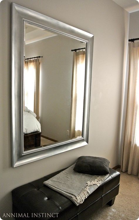 Ann from Annimal Instinct had a chunky black-framed mirror that wasn’t working with the relaxed, seaside vibe she wanted to create in her master bedroom. She decided to lighten it up with a silver finish. By layering spray paint and Rub n’ Buff, Ann was able to give her mirror a similar effect to her [...Read More] Restoration Hardware Mirror, Spray Paint Mirror, Painting Mirror Frames, Frosted Mirror, Primer Spray, Bathroom Mirrors Diy, Leaf Mirror, Diy Spray Paint, Black Mirror Frame