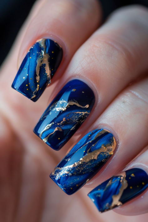 Royal Blue And Gold Marbling: Nail Designs For A Royal Blue Dress Blue Nail Manicure, Nail Art Designs Royal Blue, Blue And Gold Nail Designs Short, Blue And Gold Fall Nails, Cute Blue Nails Ideas, Blue Gold Marble Nails, Royal Blue And Gold Nails Short, Blue And Gold Wedding Nails, Blue And Bronze Nails