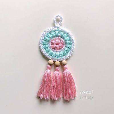 Petite Floral Dreamcatcher (Free Crochet Pattern + Video Tutorial) - Sweet Softies | Amigurumi and Crochet Crochet Rakhi Pattern, Crochet Rakhi Designs Handmade, Crochet Dreamcatcher Pattern Free, Crochet Rakhi, Fingerless Mittens Knit, Crochet Dreamcatcher Pattern, Dreamcatcher Crochet, Mandala Tutorial, Mittens Knit