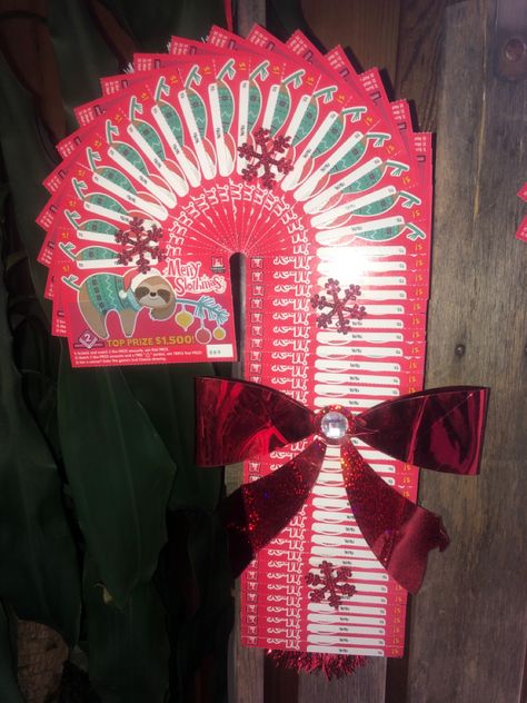 $50 worth of lottery tickets and a dollar store candy cane shaped wreath Lottery Wreath Ideas, Lottery Ticket Wreath, Lottery Ticket Christmas Gift, Feelin Groovy, Lottery Tickets, Christmas Flower Arrangements, Christmas Food Desserts, Christmas Magic, Dollar Stores