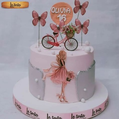 Paris Girl with cycle, butterflies on top and flower baskets. Unique cake for birthday. Customised Tall theme cakes for girls. Pink color tall Customised Theme cake by Le Torta the cake maker. 20th Birthday Cake Butterfly, Butterfly And Flower Birthday Cake, Butterfly Theme Cake 2 Tier, Debut Cake Butterfly, 29 Birthday, Cake For Birthday, Simple Frock, Paris Themed Cakes, Buterfly Cake For Kids