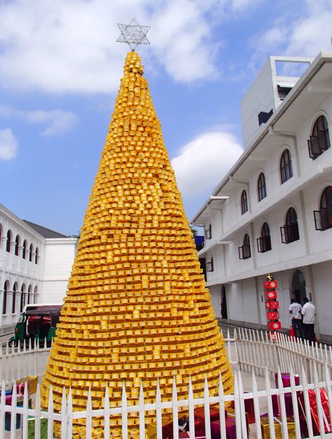 Christmas tree pyramid made from recycled margarine tubs, Colombo, Sri Lanka Colombo Sri Lanka, Public Art, Pyramid, Christmas Themes, Sri Lanka, Fair Grounds, Recycling, Christmas Tree, Christmas