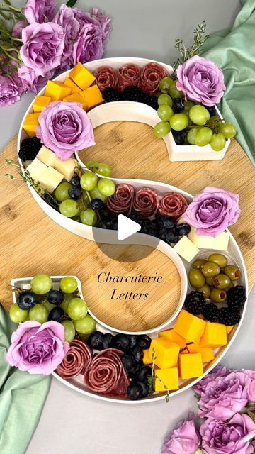 Julie | Jacksonville Charcuterie Boards on Instagram: "Charcuterie letters and numbers make the best edible centerpieces! Why not make your party food also double as decor.   I only have a few weekends left available this spring. Click the link in my bio or message me directly to book 🫶🏼  #charcuterieletters #charcuterienumbers #ambiantfood #partyfood #charcuterie #grazingtable #charcuterieboard #foodstagram #foodie #904 #904local #904eats #904bossbabes" Charcuterie Initials, Letter Shaped Charcuterie Board, 2024 Charcuterie Board Numbers, Charcuterie Board Numbers, Purple Charcuterie Board, Number Charcuterie Board, Letter Charcuterie Board, Charcuterie Letters, Graduation Tea