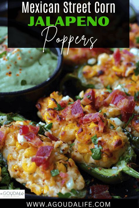 Mexican Street Corn Jalapeno Poppers - spicy jalapenos packed with melty cheese and charred corn topped with crispy bacon. Air fry, grill or oven bake. This easy appetizer is jam packed with irresistible BOLD flavor! #jalapenopoppers #mexicanstreetcorn #mexicanstreetcornjalapenopoppers #airfryerreicpe #airfryerjalapenopopper #grilledjalapenopopper #bakedjalapenopopper #recipeswithsweetcorn #grilledappetizer #tailgatingrecipe #footballfood #agoudalife Mexican Street Corn Poppers, Street Corn Jalapeño Poppers, Mexican Street Corn Jalapeno Poppers, Jalapeno Ideas, Corn Appetizer Recipes, Grilled Jalapenos, Homemade Jalapeno Poppers, Mexican Appetizer Recipes, Baked Jalapeno Poppers