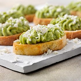 AVOCADO MOUSSE CROSTINI WITH FETA Avocado Mouse, Mouse Recipes, Avocado Dessert, Avocado Mousse, Serrano Pepper, Creole Recipes, Veggie Tray, Blue Flame, Mousse Recipes