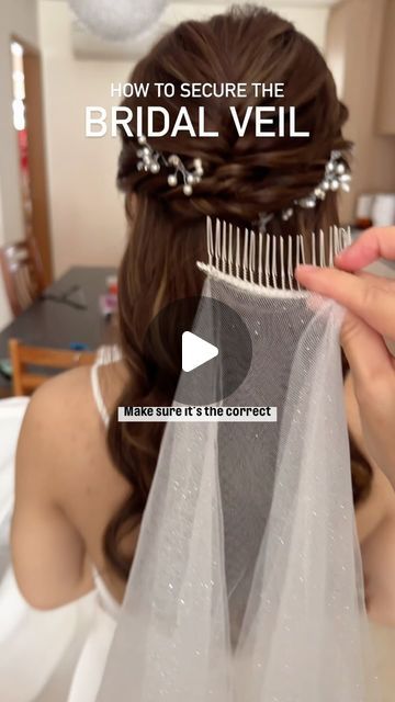 Iheartblooms, by Jenn on Instagram: "How to secure the bridal veil on a half-up hairstyle ⭐️ 

1. Choose a bridal veil that comes with a comb; this makes it much easier to put on and remove at any time during the day as you change between outfits. Check with the bridal studio for their bridal veil recommendations. 

2. Position the bridal veil in the centre of the back of the head. Wiggle the comb towards the scalp and downwards. 

3. Secure the bridal veil with one bobby pin across the comb on the right side. If the veil is long, use one bobby pin on the right side of the comb and another on the left side of the comb.

Please forward this video to your sister or bridesmaid, who is helping you with removing the bridal veil in-between outfit change on your wedding day. ❤️" Veil With Open Hair, Elbow Length Veil Hair Down, How To Put On A Veil, How To Put A Veil In Hair, Half Back Wedding Hair With Veil, Comb Pin Hairstyles, Simple Wedding Hair Down With Veil, Half Updo Wedding Hair With Veil, Veil Hairstyles Half Up