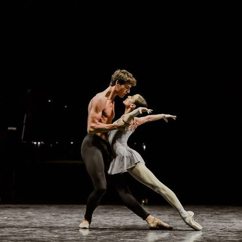 The male dancer supports the female dancer as she leans back gracefully. Beckett Cobalt, Ballet Couple, Dance Wallpaper, Dancer Lifestyle, Dance Aesthetic, Ballet Pictures, Scrub Corpo, Ballet Beauty, Dance Dreams