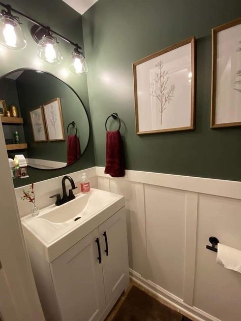 Forest Green Small Bathroom, Bathroom Paint Colors With Paneling, Green Shiplap Powder Room, Small Bathroom Green Accent Wall, Green Bathroom With Wainscotting, Painted Waynes Coating Bathroom, Olive Green Half Bath, Dark Green Bathroom Ideas Paint, Windowless Half Bathroom Ideas