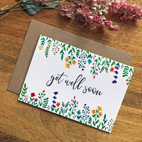 "\"get well soon\" A perfect card to send to loved ones feeling under the weather. I originally hand-painted the floral and lettering with vibrant watercolours before getting this professionally printed in the UK. Material: Tintoretto Gesso, 300gsm Card size: A6 The inside is left blank for your own personal message! Cards come with a kraft envelope. Feel free to contact me with any questions!" Flower Envelope Art, Painting On Envelopes, Floral Cards Design Handmade, Get Well Soon Handlettering, Watercolour Get Well Soon Cards, Unique Card Design, Floral Greeting Cards Handmade, Hand Painted Envelopes, Homemade Get Well Soon Cards